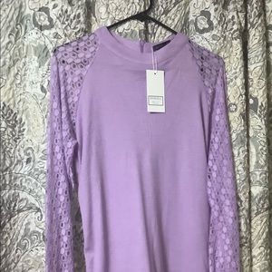 Medium Lavender ladies blouse with lace sleeves.